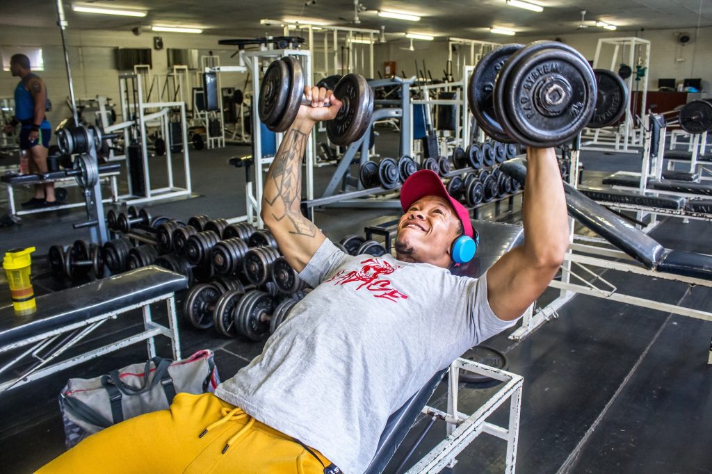 Headphones are acceptable in the gym. 